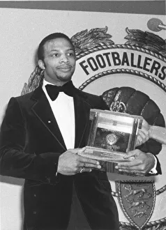 Cyrille Regis with his Young Player of the Year Award. Cyrille pipped his team-mate Cyrille Regis with his Young Player of the Year Award. Cyrille pipped his team-mate