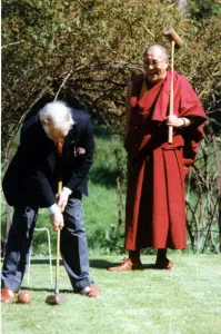 The Dalai Lama, the Tibetan spirtual leader playing croquet at the Egerton Grey Hotel at The Dalai Lama, the Tibetan spirtual leader playing croquet at the Egerton Grey Hotel at