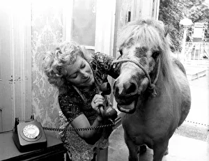 Dally the Shetland Pony and her owner Olga Denver stand in the hallway of her home as Dally the Shetland Pony and her owner Olga Denver stand in the hallway of her home as