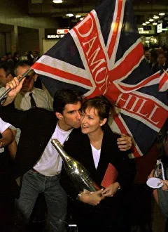Damon Hill Formula One World champion and his wife Georgie arrive at Heathrow airport Damon Hill Formula One World champion and his wife Georgie arrive at Heathrow airport