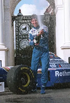 Damon Hill Motor Racing Formula One champion celebrates at Marble Arch with champagne Damon Hill Motor Racing Formula One champion celebrates at Marble Arch with champagne