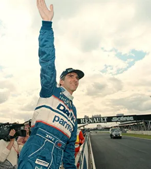Damon Hill waves to the crowd after British Grand Prix July 1997 at Silverstone after Damon Hill waves to the crowd after British Grand Prix July 1997 at Silverstone after