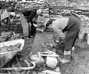 Dan Wilkinson and Raymond Johnson renovating a fresh section of the Roman fort at Dan Wilkinson and Raymond Johnson renovating a fresh section of the Roman fort at
