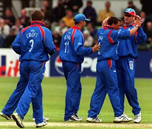 Darren Gough celebrates with Graham Hicks after bowling out Odumbe during the Cricket Darren Gough celebrates with Graham Hicks after bowling out Odumbe during the Cricket