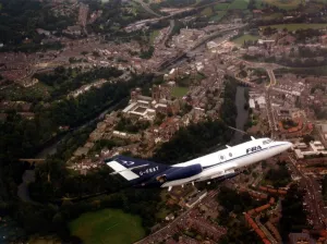 A Dassault Falcon 20 aircraft over Durham Cathedral and city A Dassault Falcon 20 aircraft over Durham Cathedral and city