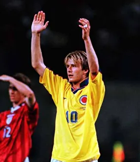 David Beckham arms aloft wearing Colombian shirt Jun 98 after Englands David Beckham arms aloft wearing Colombian shirt Jun 98 after Englands