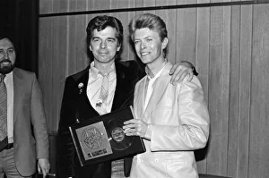 David Bowie (right) at the British Rock and Pop awards. He was named the best male singer David Bowie (right) at the British Rock and Pop awards. He was named the best male singer