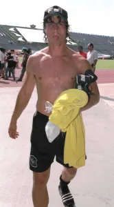 David Ginola pokes his tongue out after finishing a training session in Singapore David Ginola pokes his tongue out after finishing a training session in Singapore