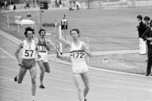 David Jenkins of Great Britain running through the tapes, arms in the air David Jenkins of Great Britain running through the tapes, arms in the air