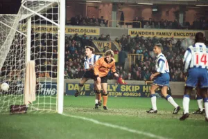 David Kelly scores against Sheffield Wednesday in the FA Cup to put Wolves one up David Kelly scores against Sheffield Wednesday in the FA Cup to put Wolves one up