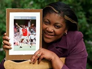 00236 Collection: Debbie Wright wife of Ian Wright Football Player 1997 holding a picture