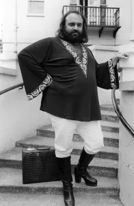 Demis Roussos July 1976 in London `Short Kaftan and white trousers Demis Roussos July 1976 in London `Short Kaftan and white trousers