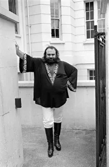 Demis Roussos July 1976 in London wearonf `Short Kaftan and white trousers Demis Roussos July 1976 in London wearonf `Short Kaftan and white trousers
