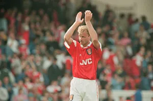 Dennis Bergkamp celebrates and applauds the fans for their support for his teams victory Dennis Bergkamp celebrates and applauds the fans for their support for his teams victory