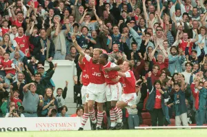 Dennis Bergkamp celebrates his first ever goal for his new club Arsenal Dennis Bergkamp celebrates his first ever goal for his new club Arsenal