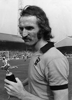 Derek Dougan receives the Daily Mirror Footballer of the Month award Derek Dougan receives the Daily Mirror Footballer of the Month award