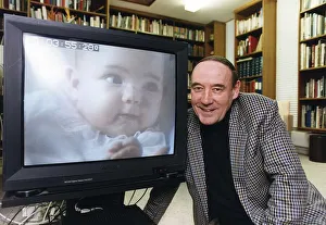 Desmond Morris anthropologist tv presenter baby watching at his home in Oxford Desmond Morris anthropologist tv presenter baby watching at his home in Oxford