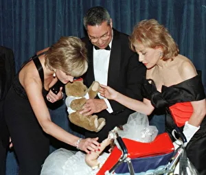 Diana, Princess of Wales accompanied by retired American general Colin Powell Diana, Princess of Wales accompanied by retired American general Colin Powell