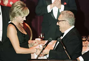 Diana, Princess of Wales receives an award former US Secretary of State Henry Kissinger Diana, Princess of Wales receives an award former US Secretary of State Henry Kissinger