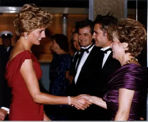 Diana, Princess of Wales shakes hands with actress Julie Walters as she attends Diana, Princess of Wales shakes hands with actress Julie Walters as she attends