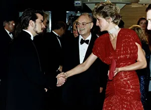 Diana, Princess of Wales talks to American actor Charlie Sheen as she attends Diana, Princess of Wales talks to American actor Charlie Sheen as she attends