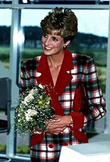Diana, Princess of Wales wears a a Catherine Walker tartan coat dress Diana, Princess of Wales wears a a Catherine Walker tartan coat dress
