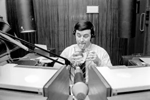 Disc Jockey Terry Wogan enjoys a large jug of water during broadcast of his afternoon Disc Jockey Terry Wogan enjoys a large jug of water during broadcast of his afternoon