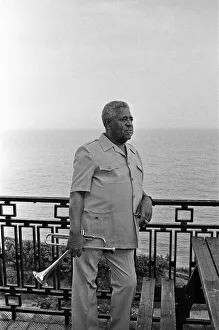Dizzy Gillespie seen here on the roof of the Lea's Cliff Hall, Folkestone Dizzy Gillespie seen here on the roof of the Lea's Cliff Hall, Folkestone