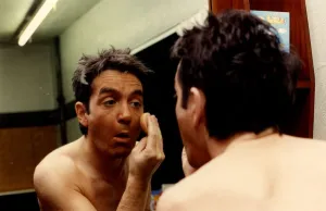 DJ Tiger Tim Stevens applies makeup to his face 18th February 1991 DJ Tiger Tim Stevens applies makeup to his face 18th February 1991