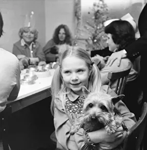 Dog Owners and their pets seen here having a Christmas party. December 1976 76-07481-001 Dog Owners and their pets seen here having a Christmas party. December 1976 76-07481-001