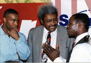 Don King Boxing promoter talks with Chris Eubank on his right Don King Boxing promoter talks with Chris Eubank on his right