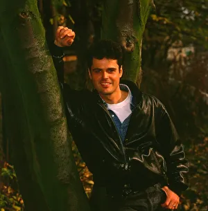 Donny Osmond singer Osmonds pop group November 1988 Leaning on a tree smiling Donny Osmond singer Osmonds pop group November 1988 Leaning on a tree smiling
