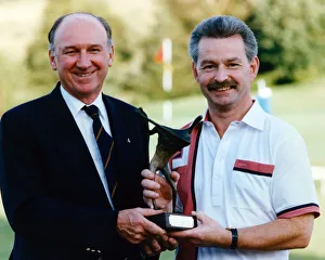 DR Masters golf winner Archie Kidd from Bridge of Weird being presented with his trophy DR Masters golf winner Archie Kidd from Bridge of Weird being presented with his trophy