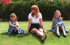 Duchess of York sits on the grass with Princess Eiugenie Duchess of York sits on the grass with Princess Eiugenie