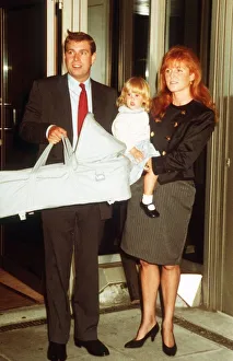 Duke And Duchess Of York with their Children Beatrice and Eugenie in her Carry-Cot Duke And Duchess Of York with their Children Beatrice and Eugenie in her Carry-Cot