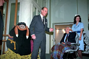The Duke of Edinburgh, Prince Philip with Cartoonist Carl Giles at exhibition of The Duke of Edinburgh, Prince Philip with Cartoonist Carl Giles at exhibition of