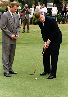 Duke Of York playing Golf with an Antique Set of Clubs presented to him at Wentworth by Duke Of York playing Golf with an Antique Set of Clubs presented to him at Wentworth by