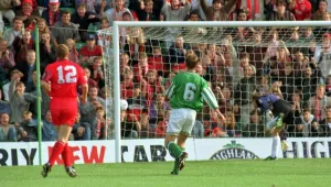 Duncan Shearer scores a goal for Aberdeens during their match against Hibernian in Duncan Shearer scores a goal for Aberdeens during their match against Hibernian in