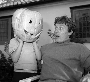 Ed Bishop with Georgina Bishop and pumpkin Mask October 1971 Ed Bishop Actor Ed Bishop with Georgina Bishop and pumpkin Mask October 1971 Ed Bishop Actor
