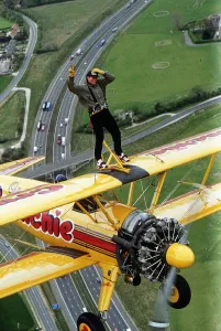 Eddie Kidd flying above M25 to publisize the Skip Lunch appeal Dbase MSI Glossary Eddie Kidd flying above M25 to publisize the Skip Lunch appeal Dbase MSI Glossary