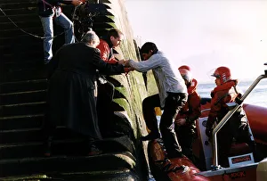 Eddie Kidd being helped off a boat after completing a TV stunt A©Mirrorpix Eddie Kidd being helped off a boat after completing a TV stunt A©Mirrorpix