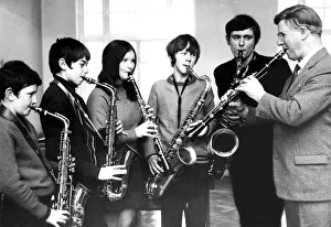 Eddie Shearer teaches the big band sound. He is seen with, from left to right Eddie Shearer teaches the big band sound. He is seen with, from left to right