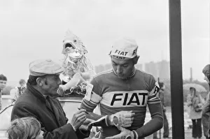 Eddy Merckx is asked to sign his autograph for a fan, as he attends Britains biggest Eddy Merckx is asked to sign his autograph for a fan, as he attends Britains biggest