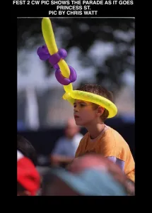 Edinburgh festival parade august 1997 Small boy with hat made of balloons animal shapes Edinburgh festival parade august 1997 Small boy with hat made of balloons animal shapes