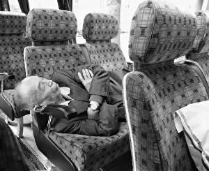 A elderly Japanese tourist finds walking around historic London to much A elderly Japanese tourist finds walking around historic London to much