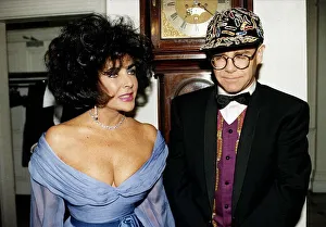 Elizabeth Taylor and Elton John together at a charity function for AIDS at Lodons Elizabeth Taylor and Elton John together at a charity function for AIDS at Lodons
