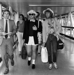 Elton John arriving at Heathrow Airport from Antigua. 20th August 1981 Elton John arriving at Heathrow Airport from Antigua. 20th August 1981