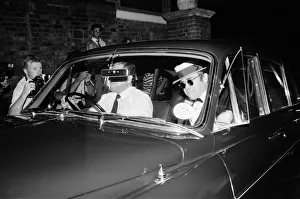 Elton John arriving at Prince Andrew's stag party. 15th July 1986 Elton John arriving at Prince Andrew's stag party. 15th July 1986