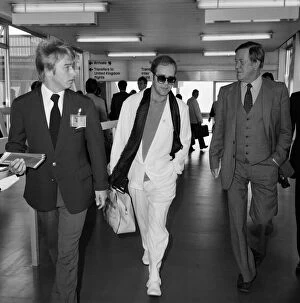 Images Dated 16th September 1979: Elton John at London Heathrow Airport. 16th September 1979