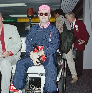 Elton John at London Heathrow Airport. 18th July 1990 Elton John at London Heathrow Airport. 18th July 1990